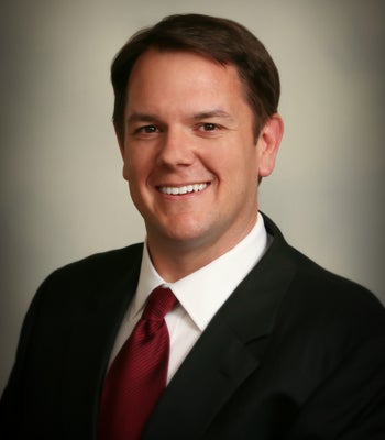 Portrait of Robby Greene, Realtor®.