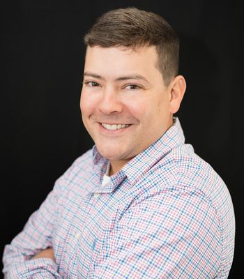 Portrait of John Pueblo, Realtor®.
